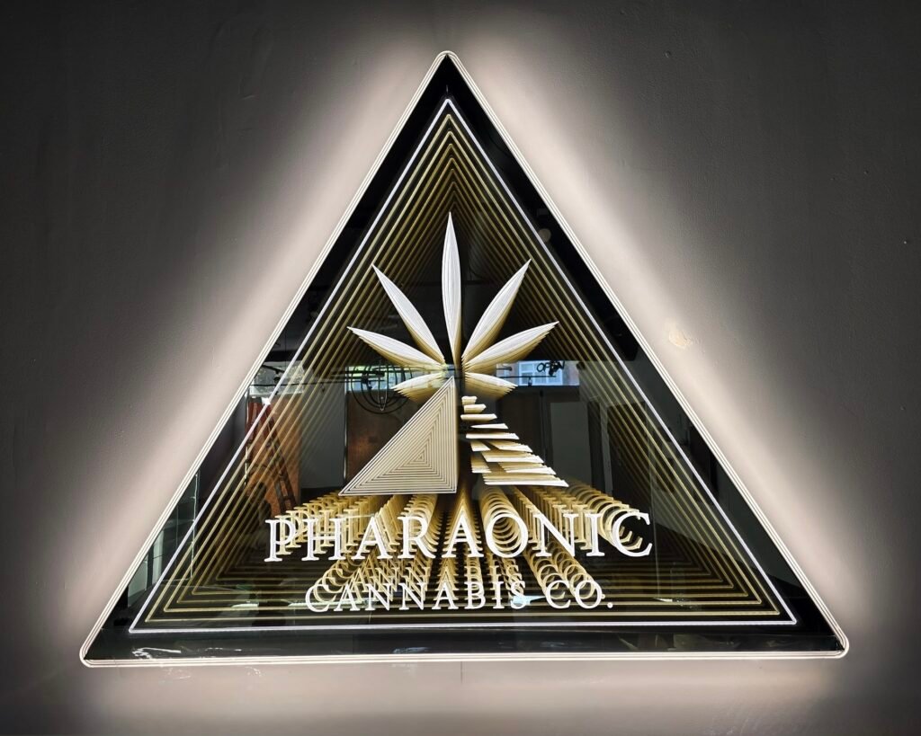 Illuminated infinity mirror sign providing unique branding for a commercial business in Ottawa.